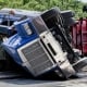 Due to their high center of gravity, semi-trucks can roll over easily.