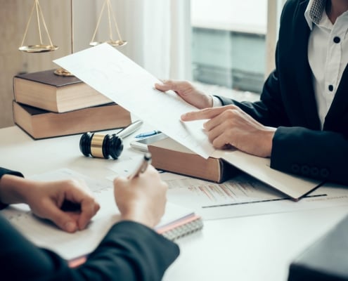 Businessman and lawyer discuss the contract document. Treaty of the law. Sign a contract business.