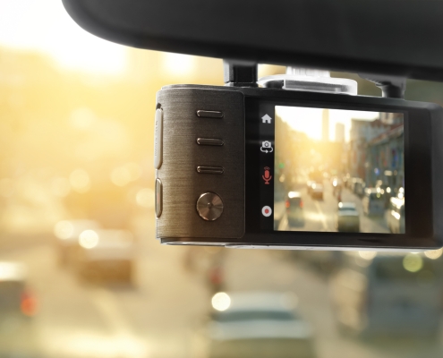 Digital video recorder car camera for safety on the road accident, Technology recorder device capturing video of front of vehicle automobile crash safety proof evidence.