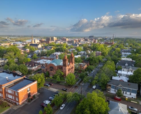 Wilmington, North Carolina, USA historic churches and downtown viewed from above.