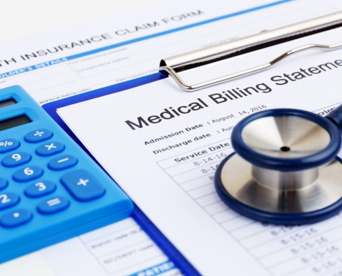 Medical bill and health insurance form with calculator