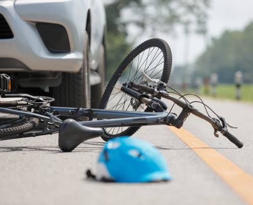 Accident car crash with bicycle on road